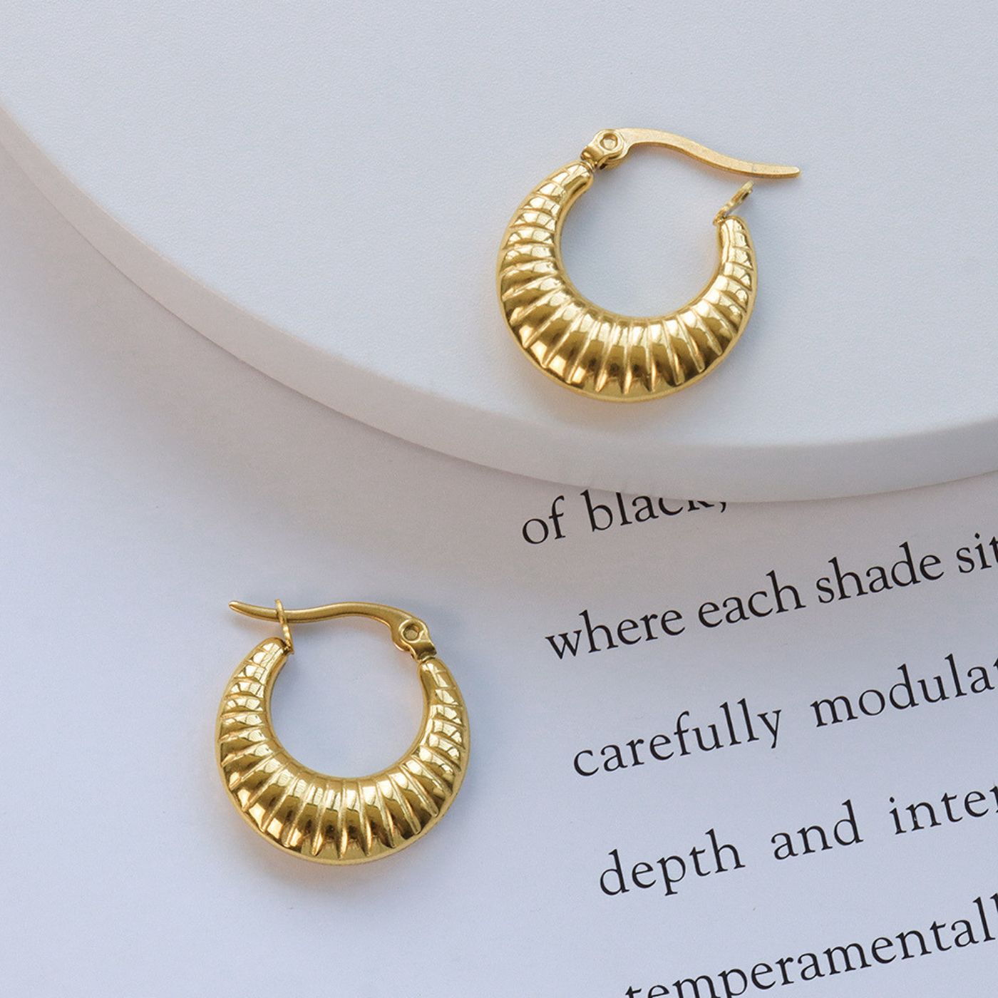 Gold-plated crescent hoop earrings