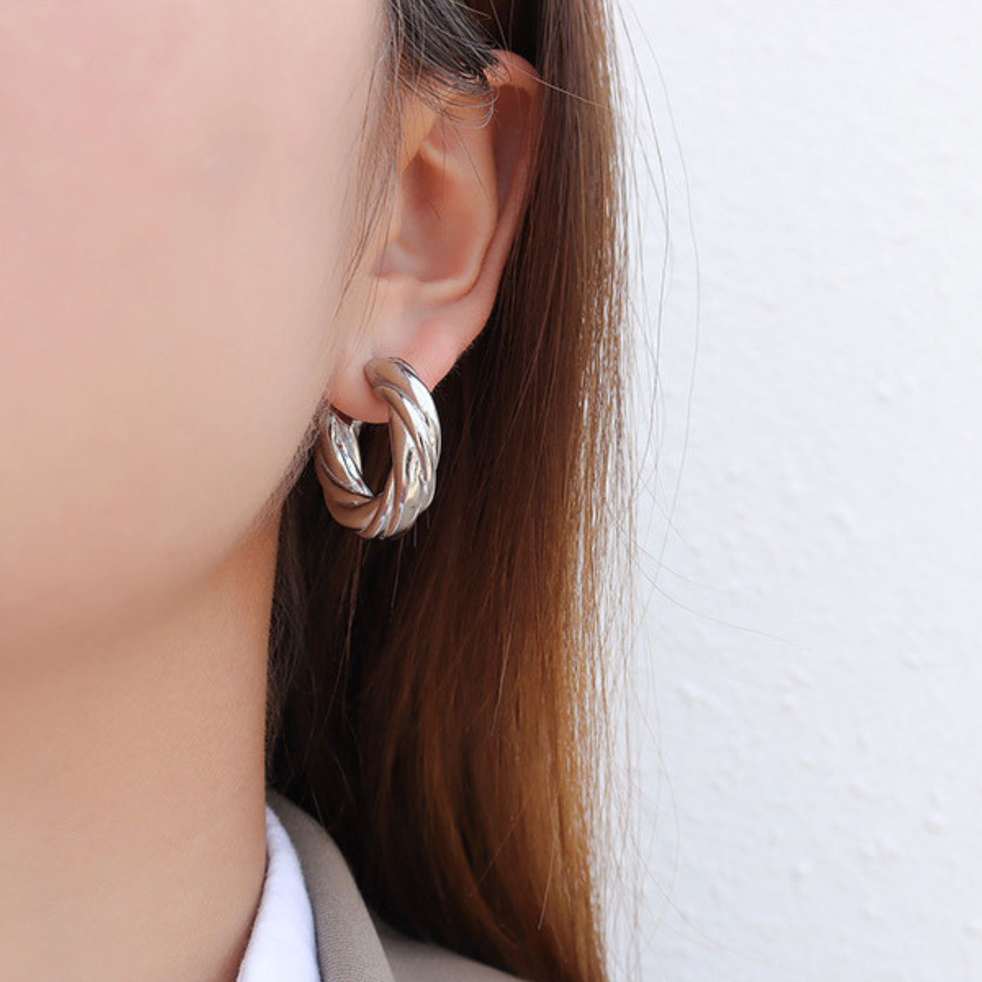 Silver-tone sculptural hoop earrings