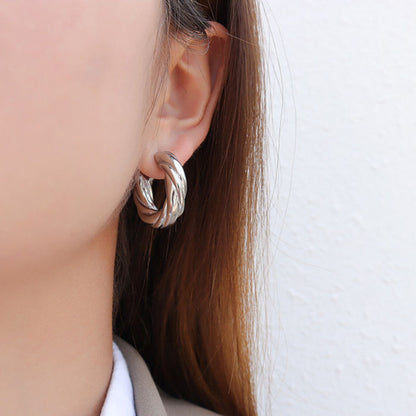 Silver-tone sculptural hoop earrings