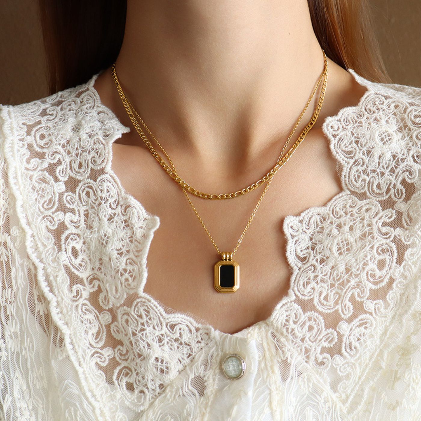 Double strand black and gold necklace